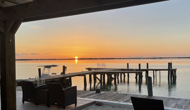 Unique, authentic, exquisite waterfront cottage with a dock.