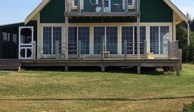 Unique Beach House Only Steps Away From North Shore Beach & Close To Golf Course