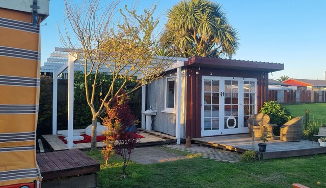 Unique, delightful Tiny Home with Alfresco living area including retro Poptop.