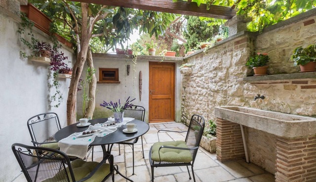 Unique flat in the centre of the old town of Porec just 150 metres from the beach with Mediterranean garden