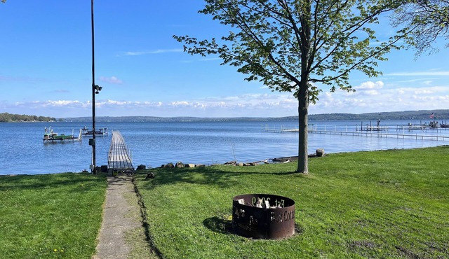 Unique Lakefront Property with dock slip and trampoline for the kids.