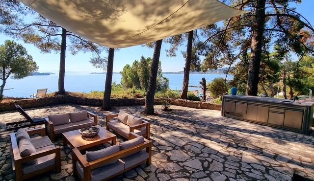 Unique location, 20m private path to the sandy beach, 5km from Corfu town.