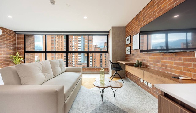 Unique loft with 1BR & sofa bed, A/C, Terrace & Rooftop Gym