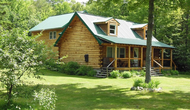 Unique Log Cabin in a Private White Mountain Setting with Spectacular Views