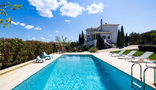 Unique Luxury villa Abelos near Airport and Athens centre, close to sandy Beach.