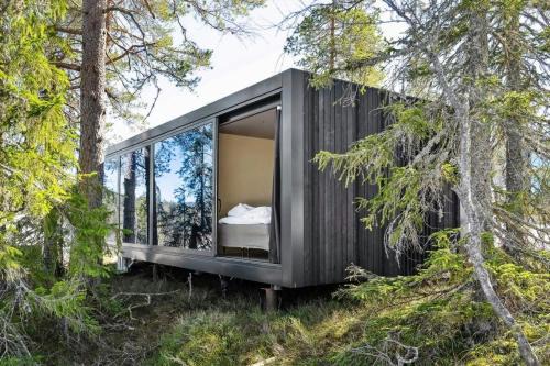 Unique, modern cabin designed by Snhetta, located at Blefjell