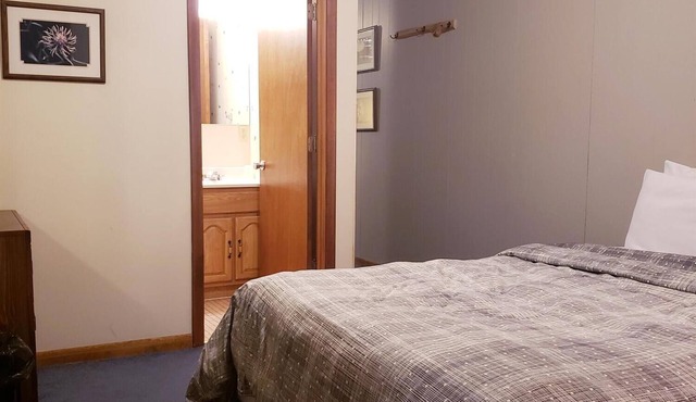 Unique, Private guestroom inside the Lodge at North Ironwood Acres resort with TWO QUEEN beds and two small bathrooms. DOG FRIENDLY!