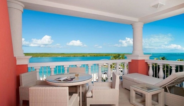 Unwind in Style – TWO Spacious 1BR Oceanfront, Infinity Pool & Water Sports