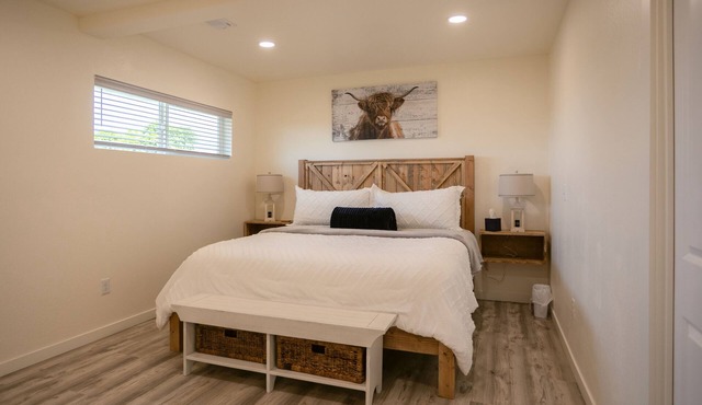 Unwind in this stylish, fully remodeled farmhouse with mountain views and a private hot tub