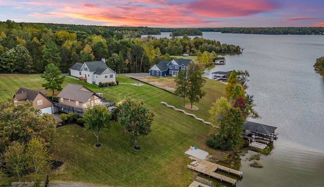 Updated lakefront home & studio with water views, hot tub, dock & game room