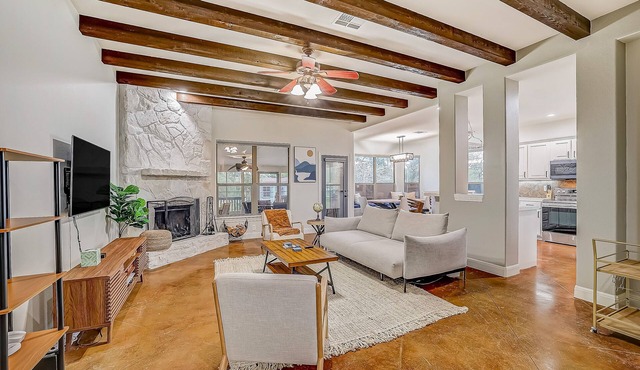 Upscale ranch retreat with hot tub, screened porch, deck & firepit