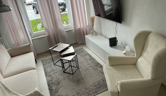 Vacation apartment (63 m²) for up to 4 people. Living room with sofa bed, kitchenette, separate bedroom, terrace