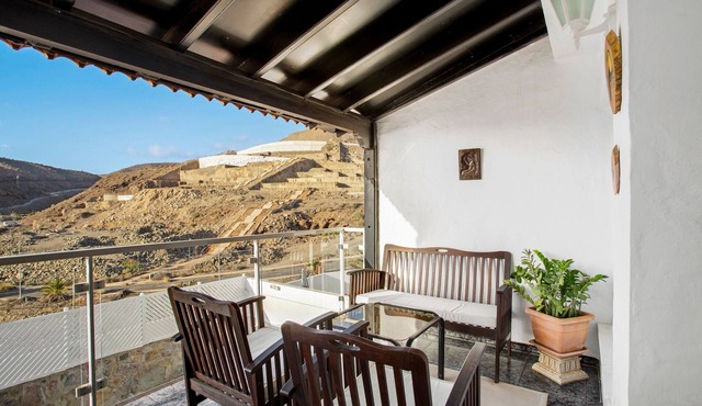 Vacation Apartment 'Casa Los Caideros' with Sea View, Shared Pool and Wi-Fi
