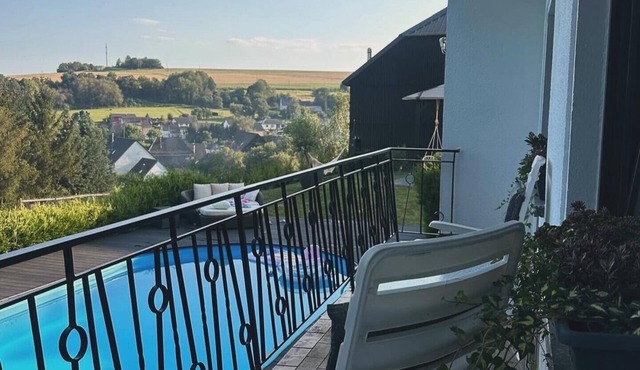 Vacation apartment with pool in the countryside, great hiking trails and ski area nearby.