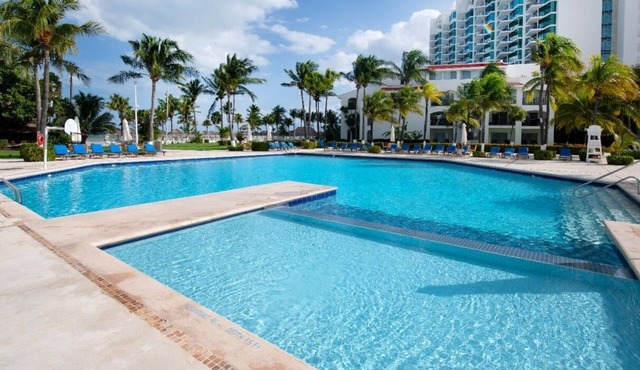 Vacation getaway with beach access & balcony