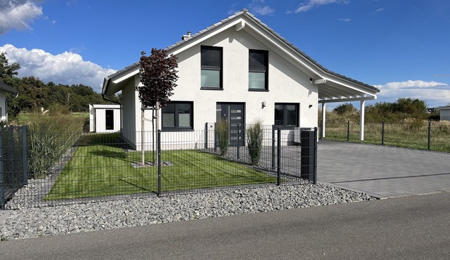 Vacation home Hilde on the lake with private beach for 4 adults, fireplace, boat and sauna