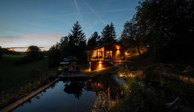 Vacation home in the Schwabische Alb with swimming pond and sundeck.
