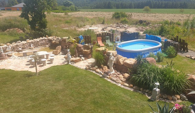 Vacation home "Palmenland " with sauna, whirlpool, small waterfall and water place