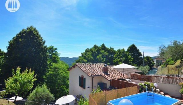 Vacation home with hillside view and pool