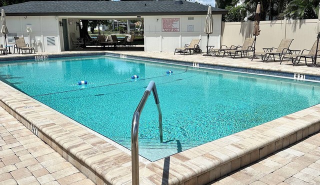 Vacation in the Forest CC heated pool view of golf course near beaches airport