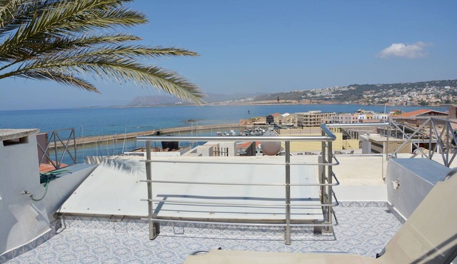 Venetian house overlooking the Venetian harbour and the city of Chania