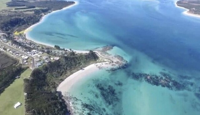 Very close to the beach, right in the heart of Rangiputa