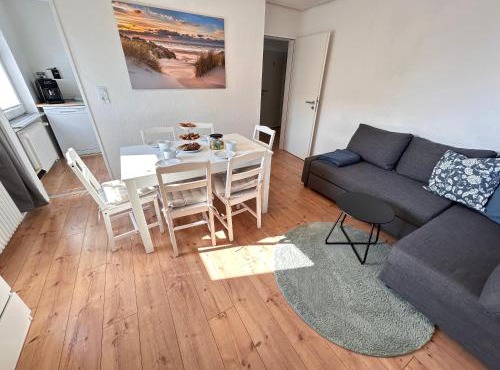 Vier Nordlichter - Große Ferienwohnung mit Dachterrasse 3 Schlafzimmer Bensersiel