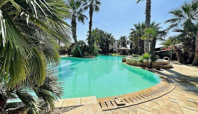 Villa Adelaide: A welcoming two-story villa situated at a few steps from a sandy beach, with Free WI-FI.