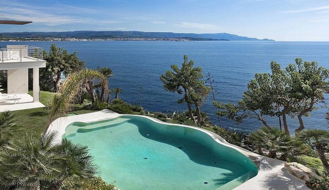 Villa Amenea: A charming and bright two-story villa built directly above the sea, with Free WI-FI.