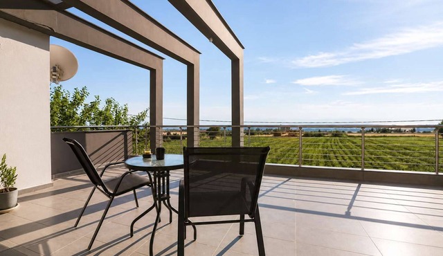 Villa Erytha - Serene Retreat with Views & Garden