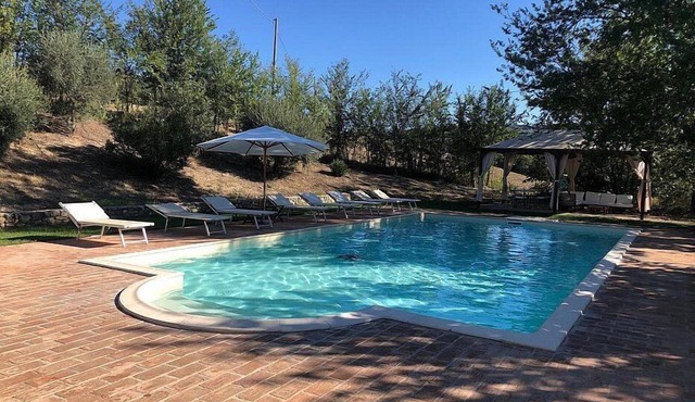Villa Gramigna: A charming two-story villa surrounded by the greenery.