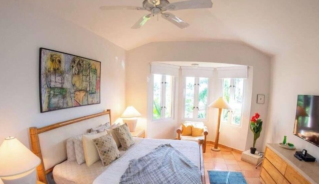 Villa Granada within Dorado Beach Resort grounds, pool nearby