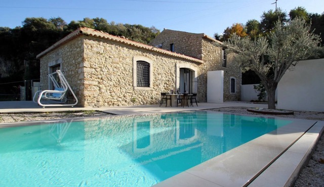 Villa Strega is surrounded by olive groves and Sicilian donkeys that roam freely across the land. Once an ancient stone farmhouse and old olive mill, it has now been transformed into an exclusive residence that preserves its historic charm while offering