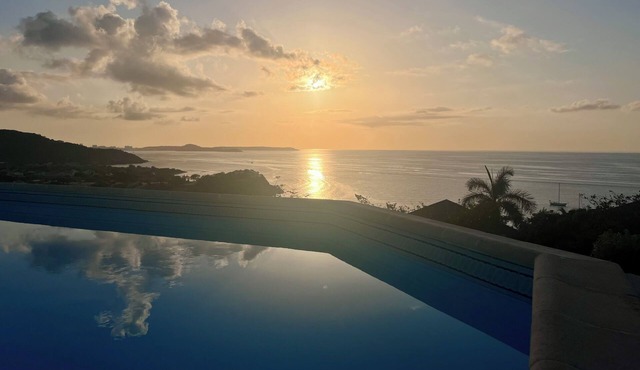 Villa lucie, Sunset over Friars bay and Anguilla