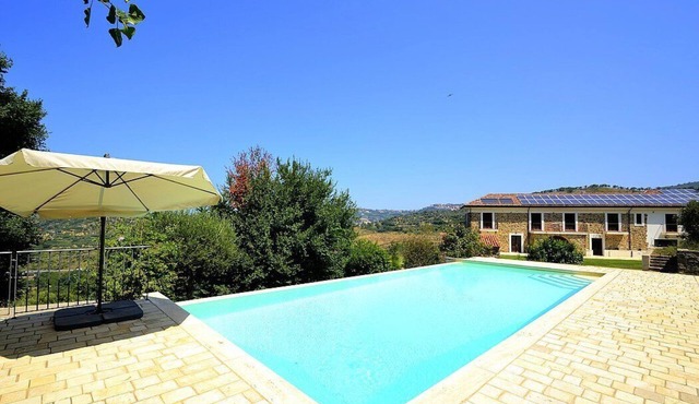Villa Nefele: A spacious and welcoming two-story villa in a quiet position, located on a hillside above the sea, with Free WI-FI.