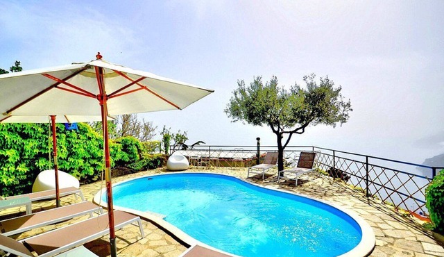 Villa Tecla A: A characteristic two-story independent house located on a hillside, facing the sea, with Free WI-FI.