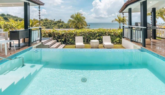 Villa with ocean view/bbq/pool/resort access