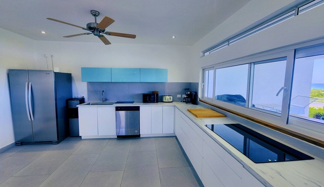 Villa with pool. Sea view. 4 bedrooms, kitchen. Las Terrenas over playa bonita.