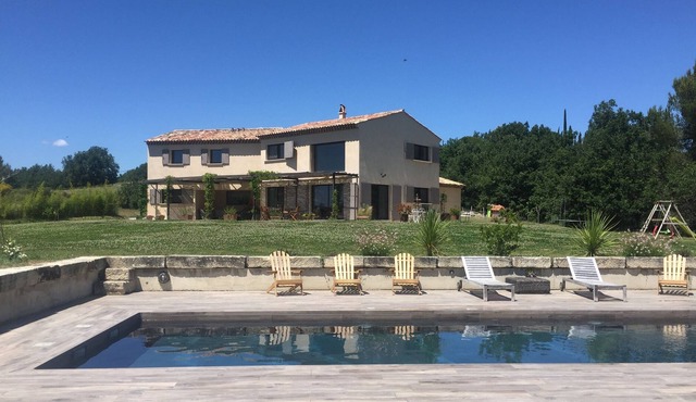 Villa with swimming pool surrounded by nature