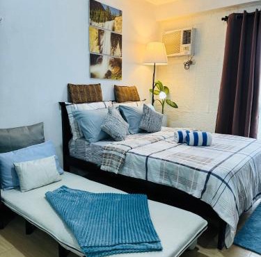 Vinia Infinity Studio 2 Near Malls with WiFi Netflix and Karaoke