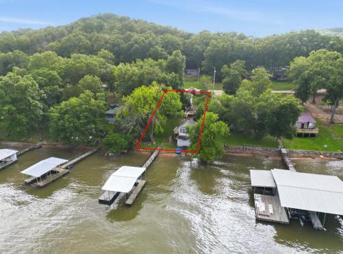 Visit this 4 Bedroom - 3 Bath Lakefront Home with Private Dock
