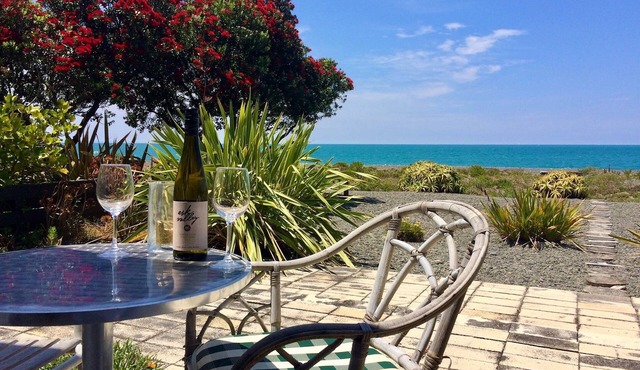 Walk on Waterfront & big views define this newly renovated Beach House. Pets OK