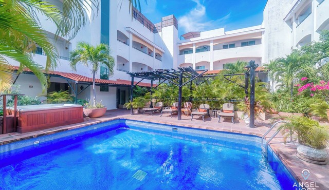 Walk to 5th Ave & Beach · Pools, Balcony & Parking