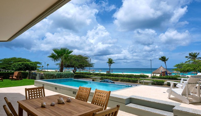 Walk to Eagle Beach – Exclusive 6BR Beachfront Condo with Private Pool & Jacuzzi