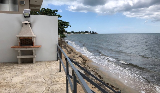 Walk to the beach from your beachfront 2 bedroom villa, sleeps 5