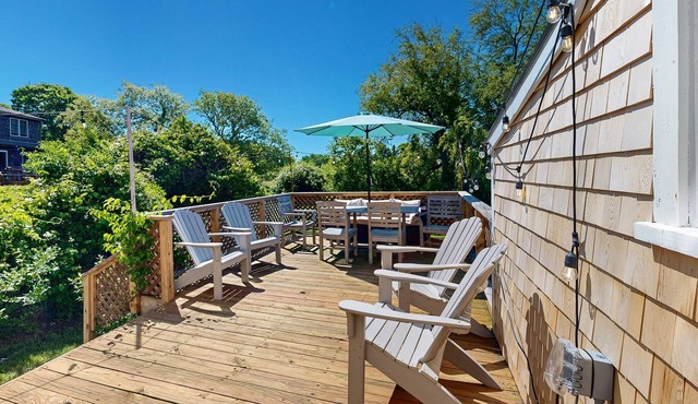 Water-view home in great location with spacious backyard, grill, kayaks, dogs OK