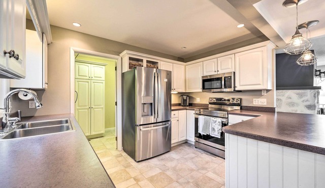 Waterfront Dewittville Condo w/ Furnished Balcony!