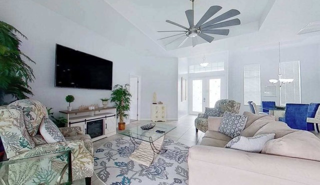 Waterfront home with private pool, dock, WiFi, central AC, and desk workspaces