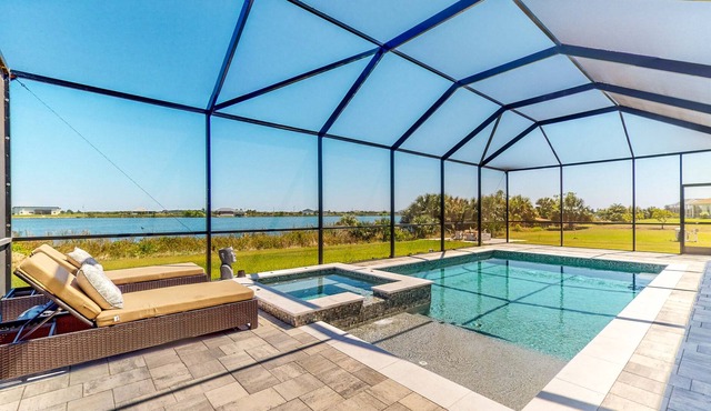 Waterfront modern home with pool & hot tub
