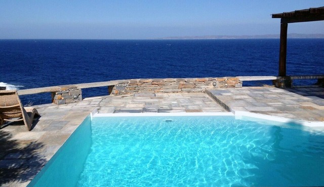 Waterfront Villa with private swimming pool-walking distance to a sandy cove.